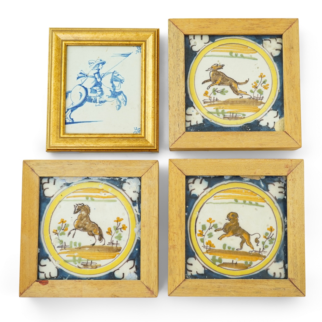 Three Spanish polychrome maiolica ‘animal’ tiles, Triana, early 18th century and a Delft blue and white tile, 19th century